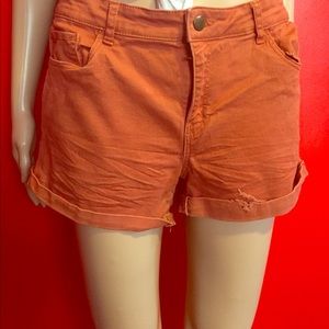 Orange short shots tight fitted.